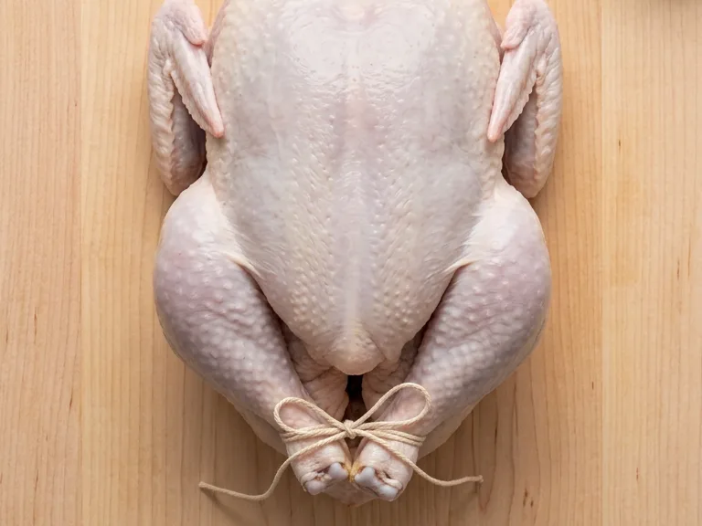 Chicken legs tied with cotton twine