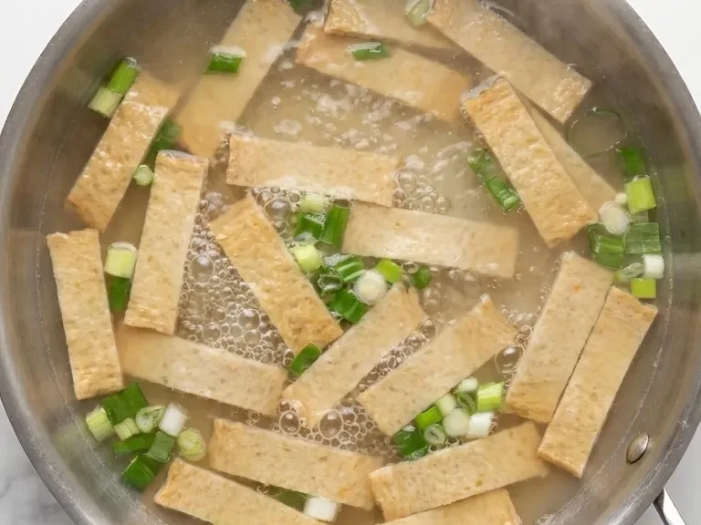green onion and fish cake broth simmering for a tteokbokki recipe