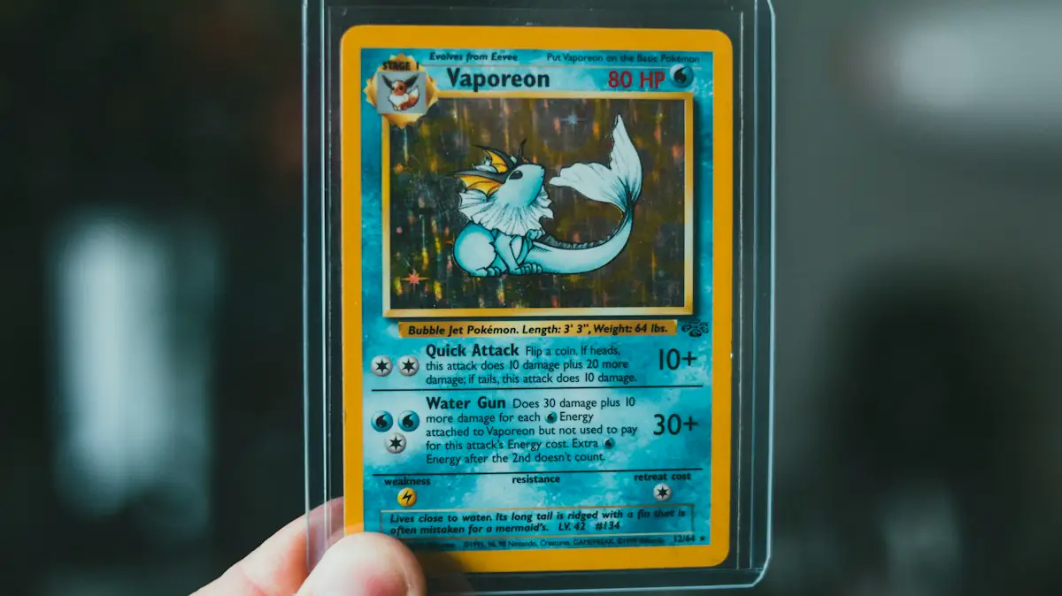 A Pokemon card held in a rigid toploader, the storage every Pokemon 30th Celebration foil needs